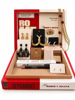Cigar box filled with make up and Women Jewelry